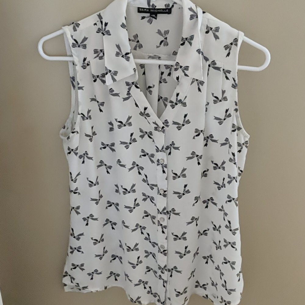 Button down collared sleeveless B&W sheer bow top